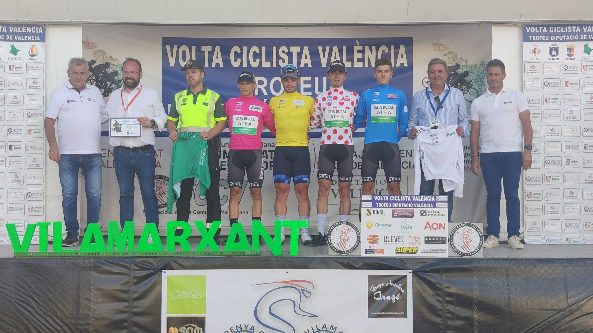 Podium de la primera de Valencia con Kogut de amarillo